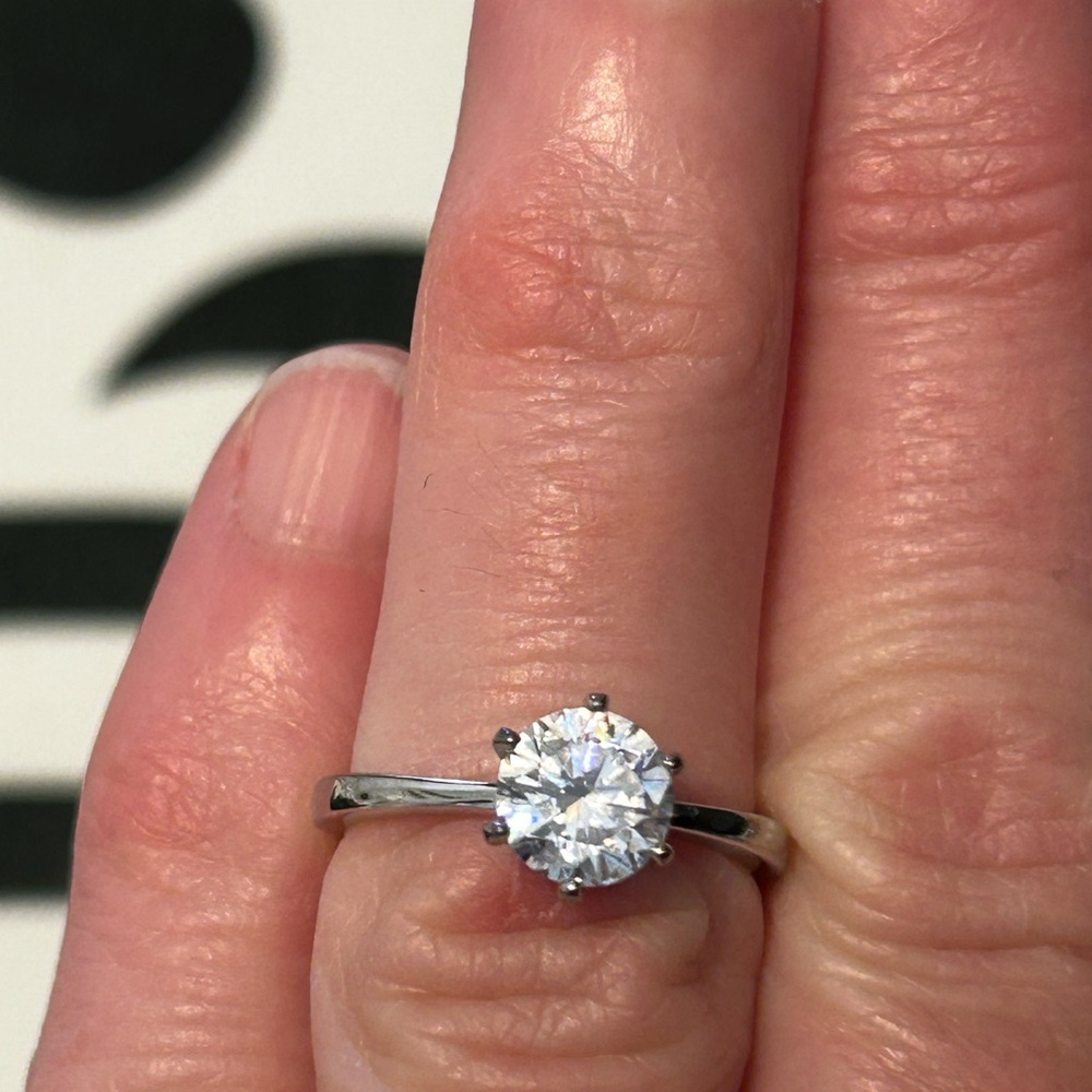 Sterling silver and cubic zirconia solitaire ring.
